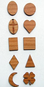 Examples of Laser Cut Wood Shapes add cutouts and Engraving to Complete Your Design