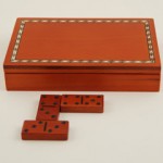 Our Domino Set is stored in a lovely Rosewood box with an inlay border around the top. The price includes two free lines of text engraved on the box or customize your set, Just contact us with your ideas.